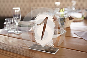 Guest table number. Wedding table in the restaurant.