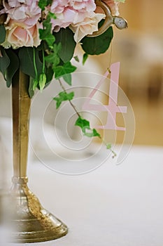 Guest tables with candlestick and number of this table