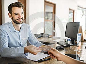 Guests checking in with credit card payment to a hotel