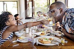 Guests having breakfast at hotel restaurant photo