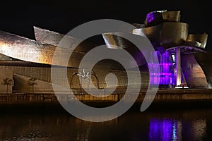 Guggenheim museum at night in bilbao, spain