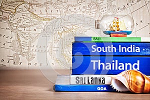 Guide books with ship