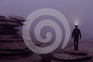 Guide lighting in the fog in the Natural Park of El Torcal de Antequera, in Malaga, Andalucia, Spain