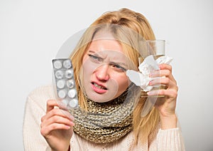 Guidelines for treating cold. Take medications to get rid of cold. Girl take medicine drink water. Headache and cold