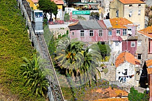 Guindais Funicular or Funicular dos Guindais and picturesque houses in historic centre of Porto city, Portugal, October 06, 2018