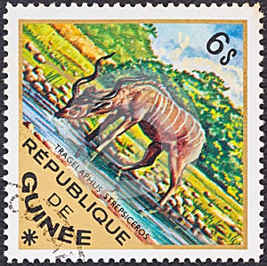 GUINEA - CIRCA 1975: A stamp printed in Guinea from the `Wild Animals` issue shows a Greater Kudu Tragelaphus strepsiceros