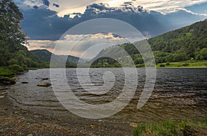 Guiness Lake, Glendalough, Wicklow Mountain, Ireland, at Sunny and cloudy Day