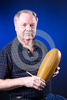 Guiro Goard Being Played