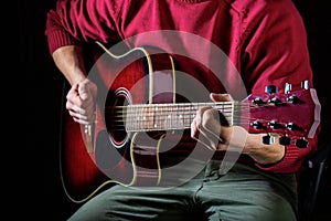 Guitar acoustic. Play the guitar. Instrument on stage and band. Music concept. Electric guitar, string, guitarist