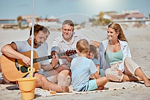 Guitar, beach picnic and family on holiday, ocean bonding and musical entertainment in Portugal. Happy, travel and man