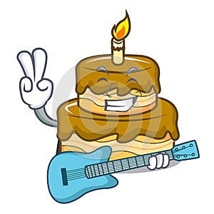 With guitar birthday cake mascot cartoon