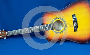 Guitar on blue background