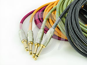 Guitar cable on white background