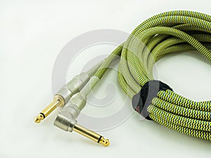 Guitar cable on white background