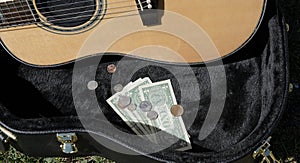 Guitar case with money busker