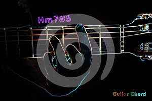 Guitar chord on a dark background