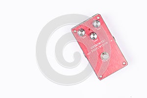 Guitar Distortion pedal isolated above white background