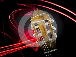 Guitar head and abstract red lights