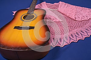 Guitar and knitted wool shawls