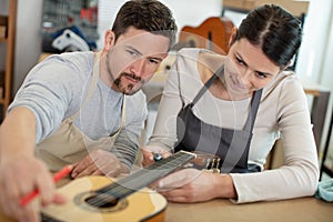 guitar maker and craftsma at work