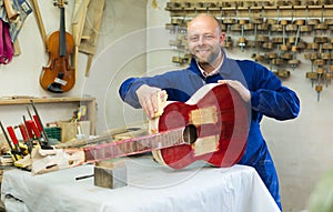 Guitar-maker at workshop