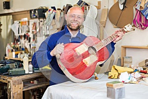 Guitar-maker at workshop