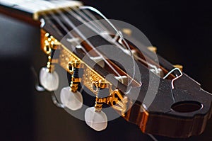 guitar neck with strings and amplifiers photo