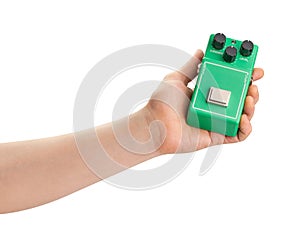 guitar overdrive pedal in hand