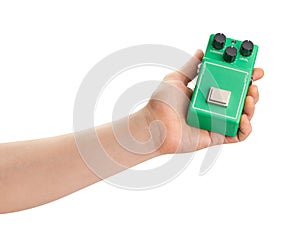 guitar overdrive pedal in hand photo