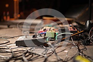 Guitar pedal and cables photo