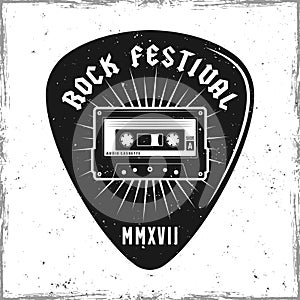 Guitar pick with audiotape and text rock festival