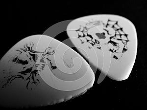 Guitar picks on the dark backround
