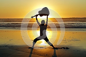 Guitar player on the beach