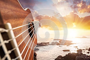 Guitar player on the beach