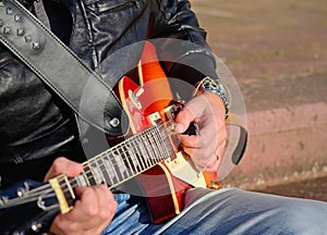 Guitar player with electric guitar