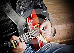 Guitar player with electric guitar