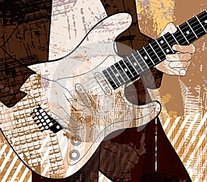 Guitar player on grunge background