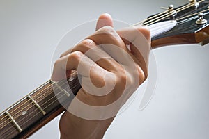 Guitar Player Hand in C Major Chord on Acoustic Guitar