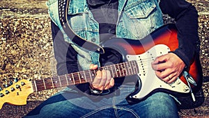 Guitar player playing in the street