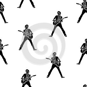 Guitar player silhouette. Black silhouettes on a white background. Vector seamless pattern illustration. Great for paper projects,