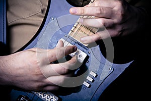 Guitar playing close up