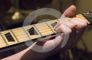 Guitar practice under the dim light