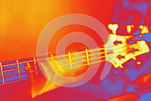 Guitar rock musician hand movement defocus rock music. Selective focus. Thermography gradients, retro glitch, noise