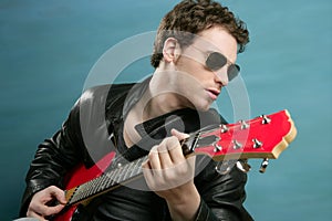 Guitar rock star man sunglasses leather jacket