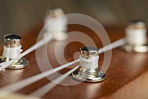 guitar string vibrating close-up, small depth of field