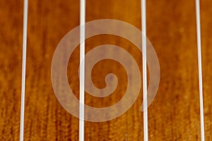 guitar string vibrating close-up, small depth of field