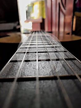Guitar strings blurred