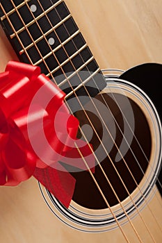 Guitar Strings with Red Ribbon