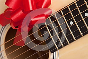 Guitar Strings with Red Ribbon