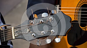 Guitar strings with tuning knobs